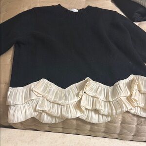 Women's Black Crewneck Sweater with Cream Ruffle Hem